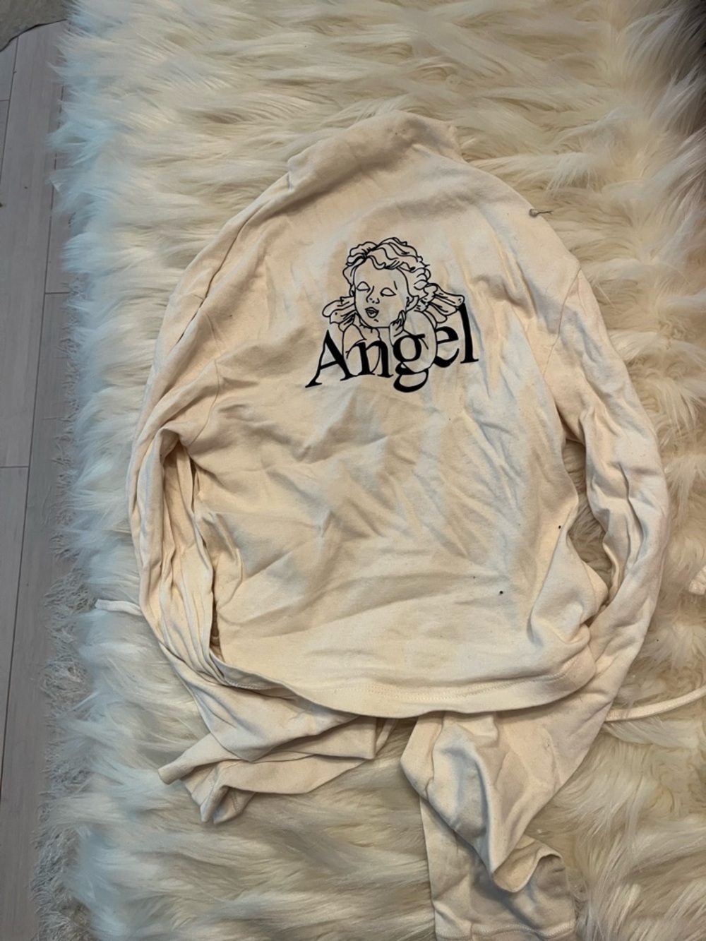 Urban Outfitters Cream Long Sleeve Cut-Out Top with Black Angel Graphic